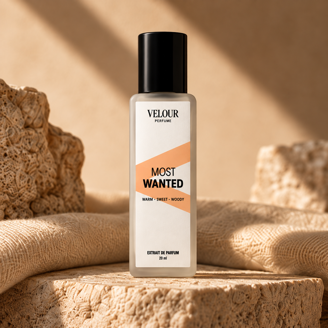 Most Wanted by Velour Perfume, 20ml Extrait de Parfum bottle on warm stone